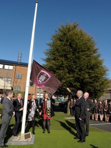HRH The Duke of Gloucester unfurls the new school flag